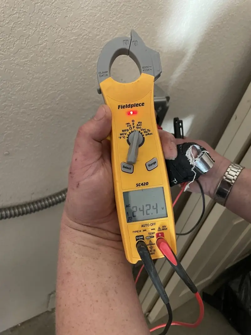 Voltage testing with clamp meter during Generator Installation in Egypt Lake-Leto